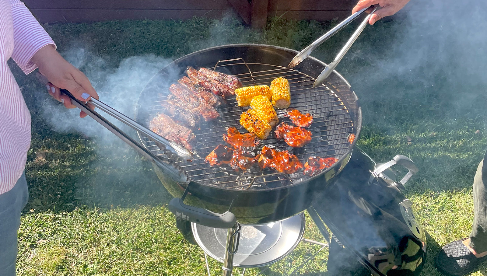 Person grilling at the BBQ