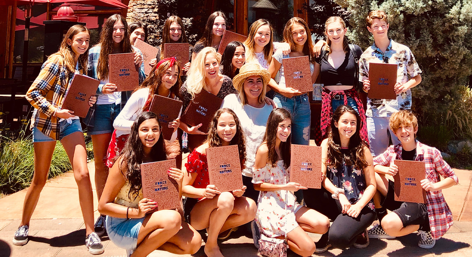 Group Posing for Lazy Dog Restaurant Fundraiser