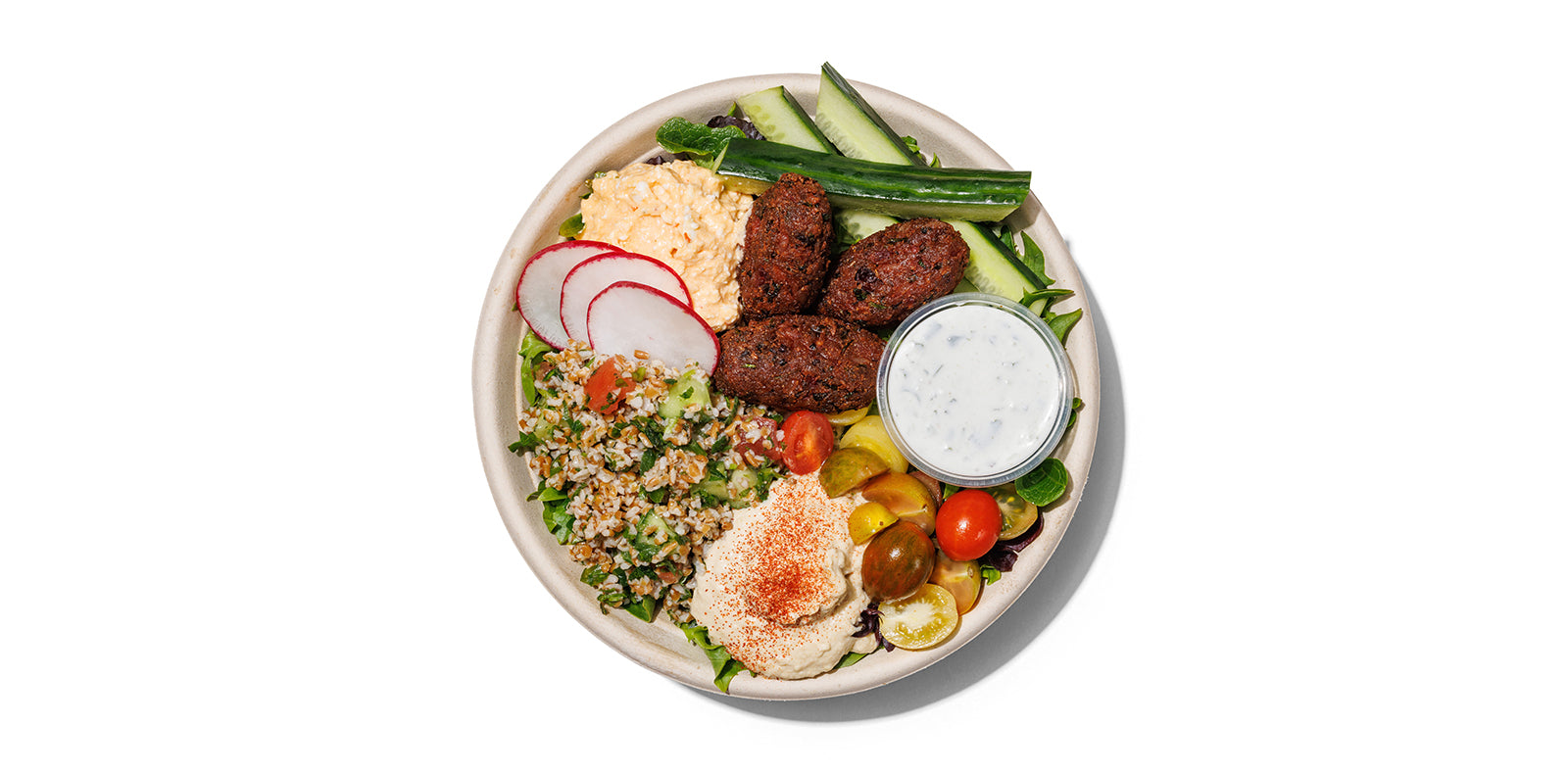 Black bean falafel, hummus, feta, mixed greens, tabbouleh, veggies, lemon vinaigrette & tzatziki